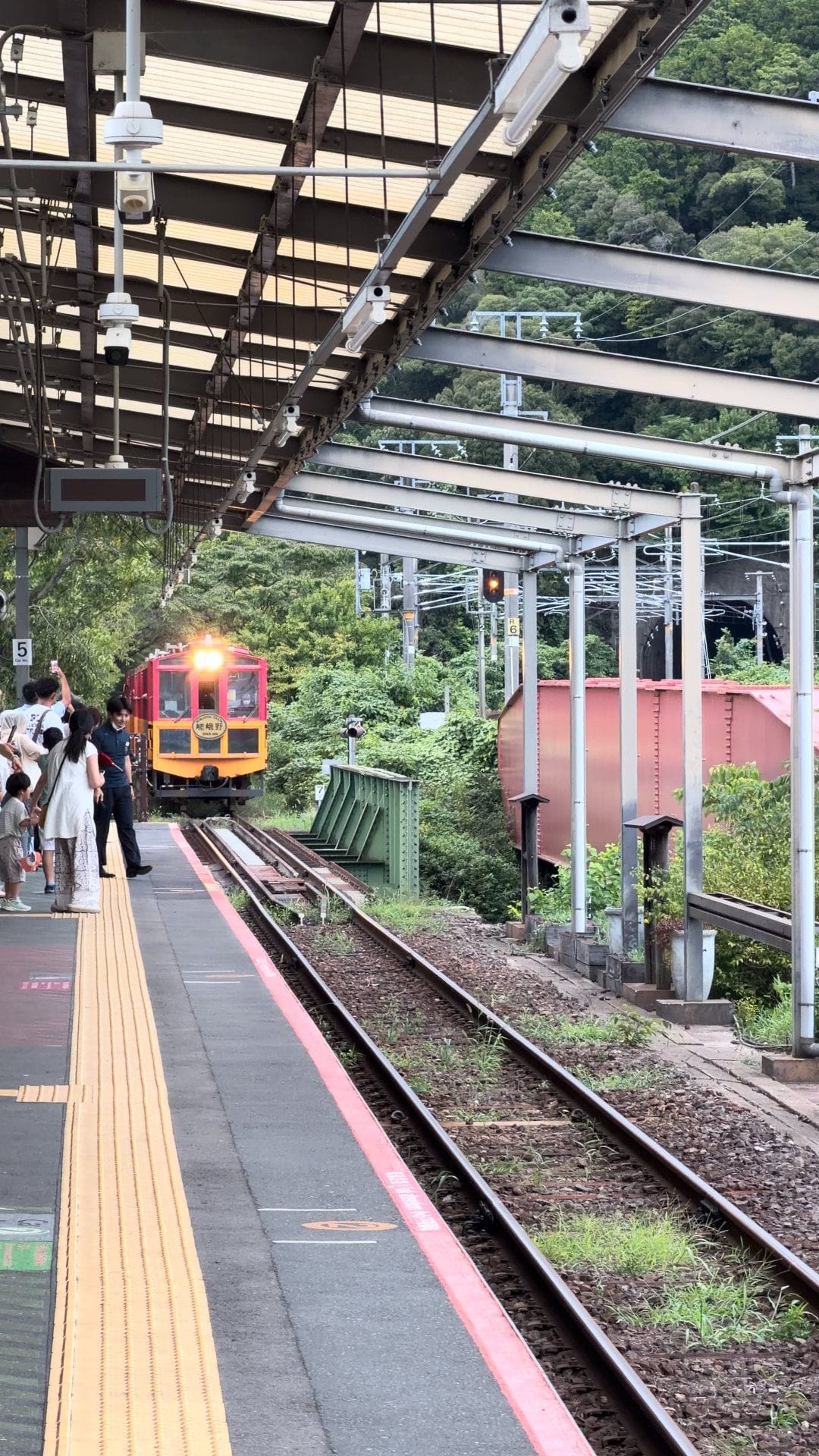 The Sagano Romantic Train arriving at the station