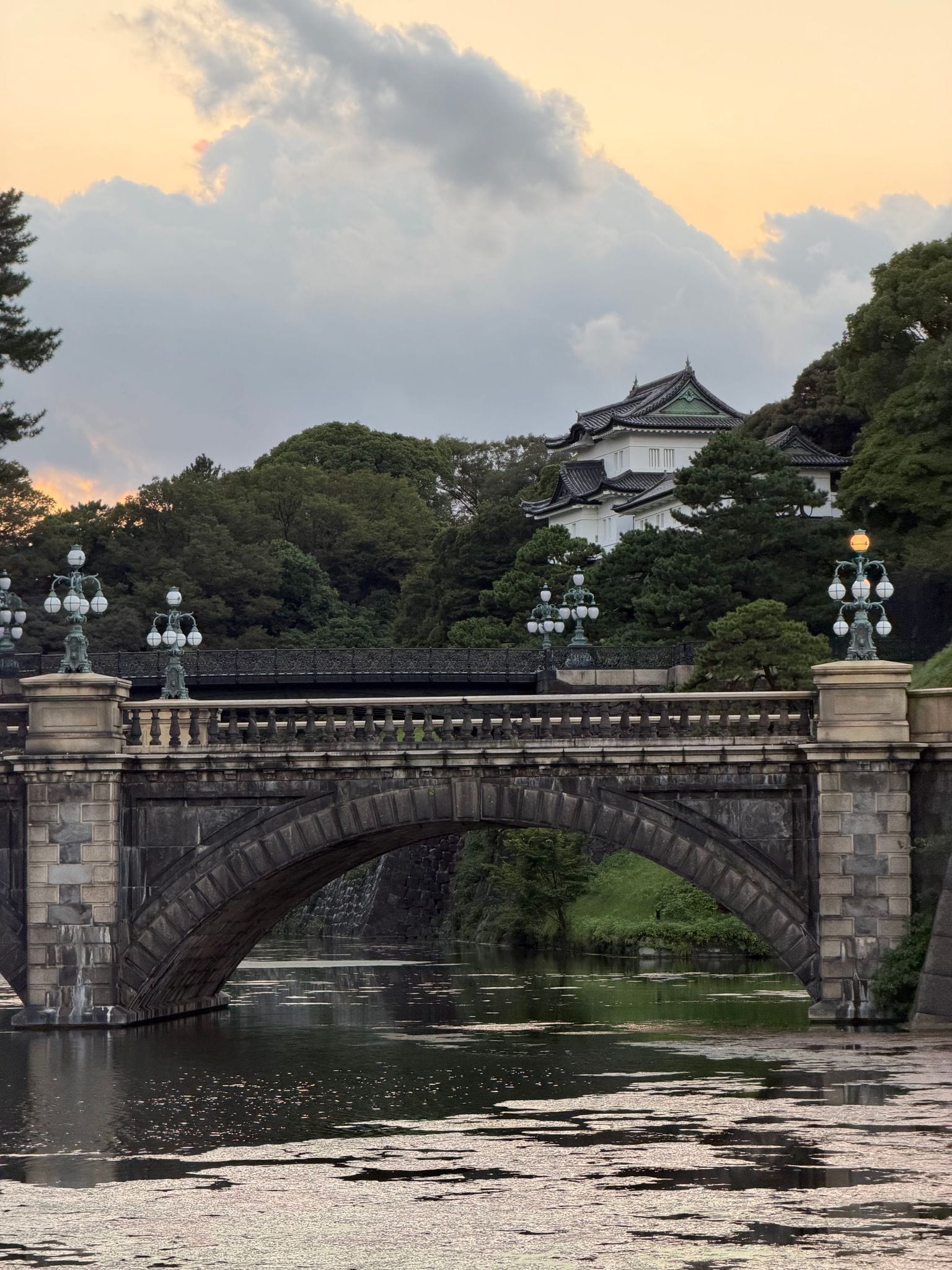 The Imperial Palace moat and bridge in Tokyo at sunset
