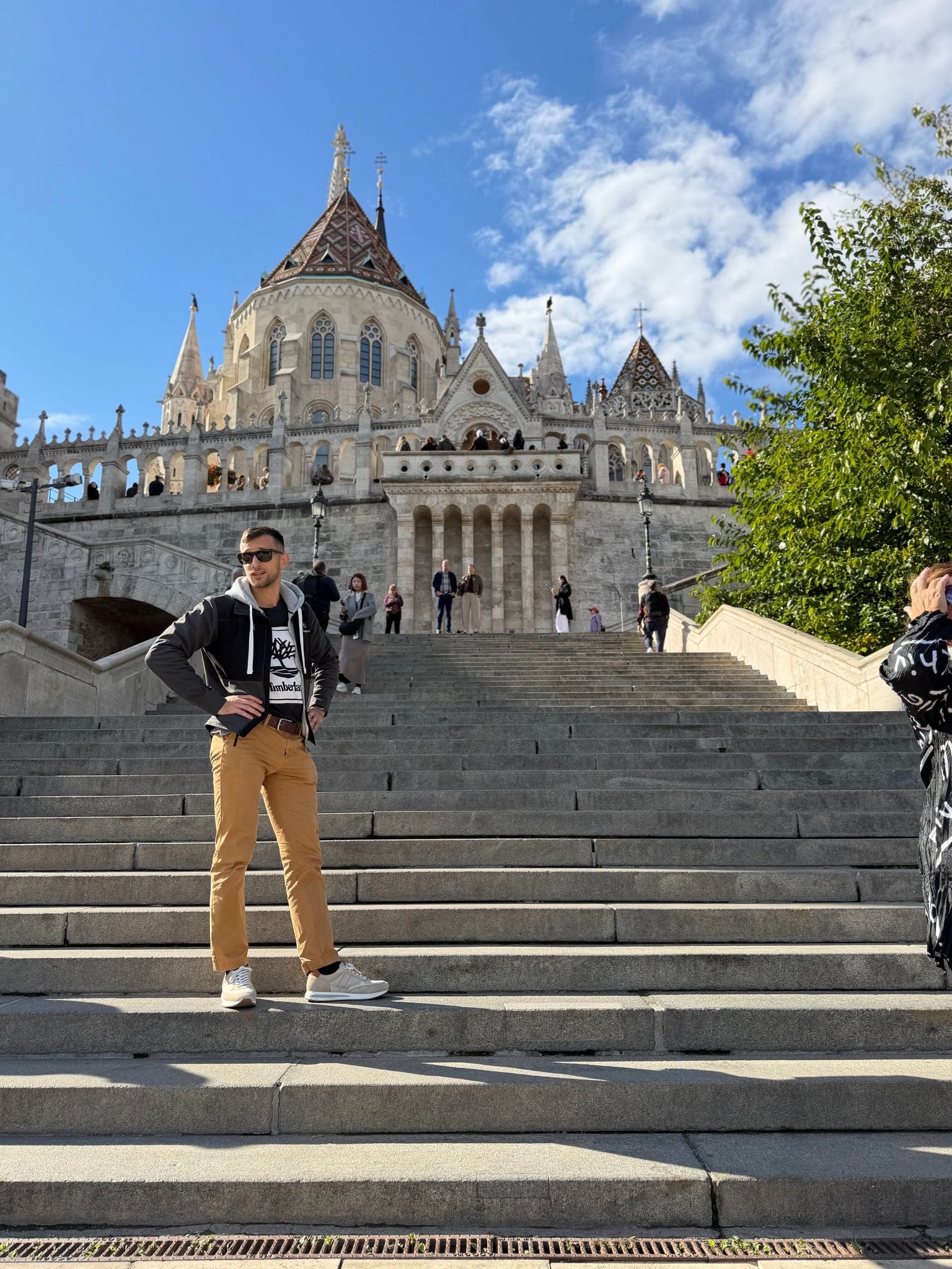 Me on the stairs of Fisherman's Bastion, Matthias Church behind