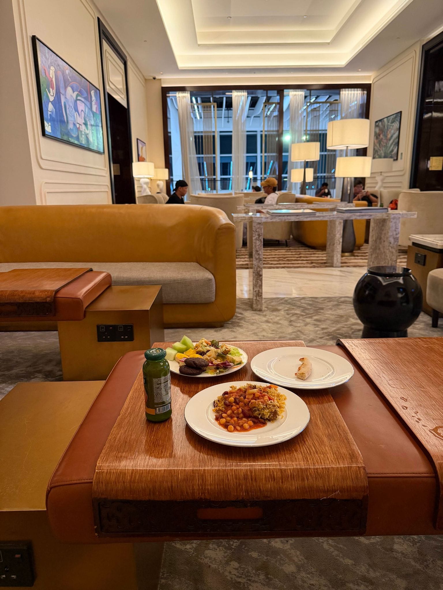 Dinner at The Pearl Lounge: rice with chickpeas and beans, salad and cookies, the lounge hall behind
